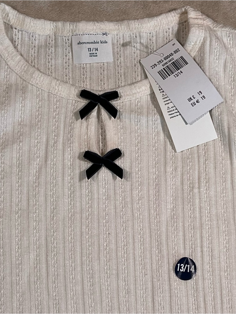 abercrombie kids Cream Ribbed Long-Sleeve Top with Black Bow Accents - Picture 2 of 3